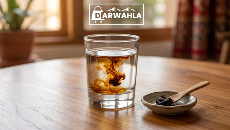 Shilajit dissolving in water, releasing natural, potent swirls to show humic acid benefits